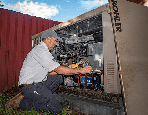 RSC service technician conducting commercial heat system maintenance.